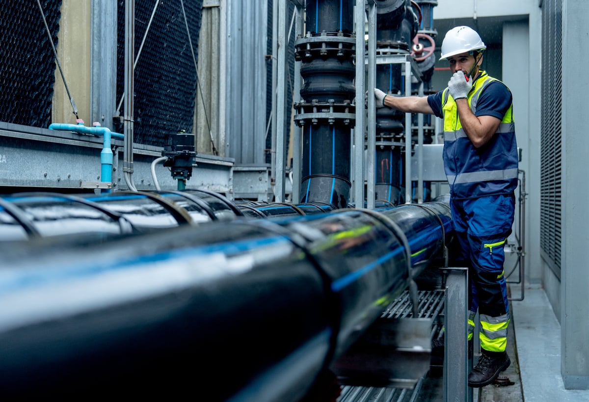 Professional technician performing commercial building maintenance and repairs